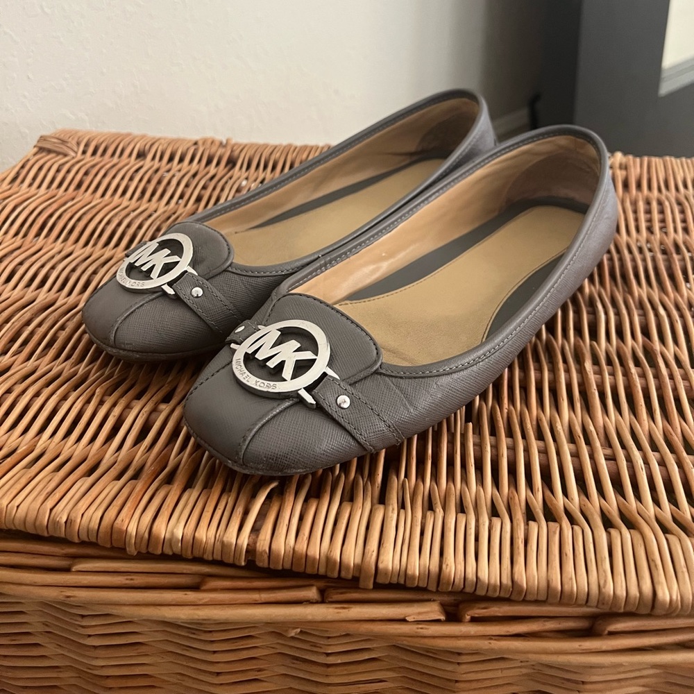 Gently used Michael Kors gray flats.